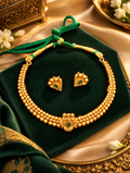 Traditional Gold-Tone Necklace Set with Green Stone Accents & Matching Earrings
