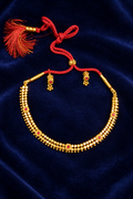 Traditional Gold-Tone Necklace with Red Stone Accents & Red Dori