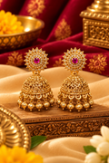 Gold-Tone Floral Jhoomka Earrings with Pink Stones